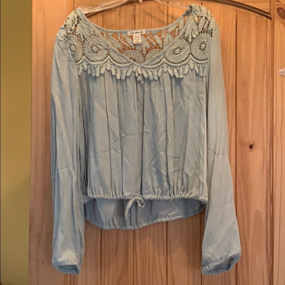 Pale green blouse with lace detail